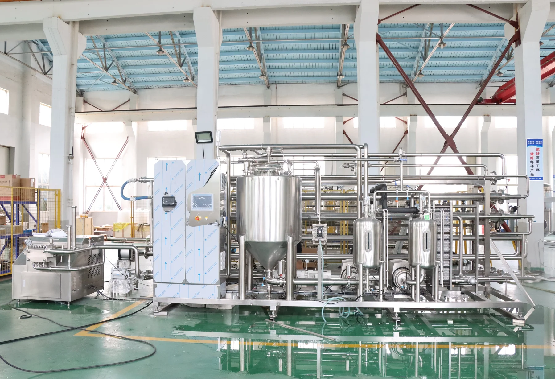 Actual tube-in-tube sterilizer with stainless tube bank, vessels, pumps and control cabinet